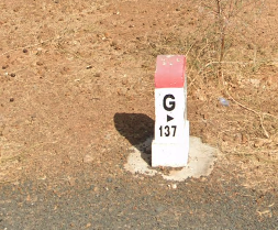 <Kilometer marker front>